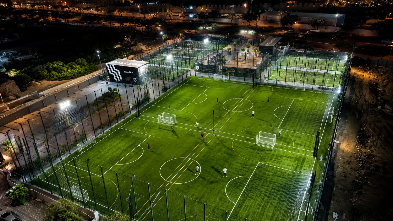 Overhead view of the football pitches and surrounding courts at Ballers
